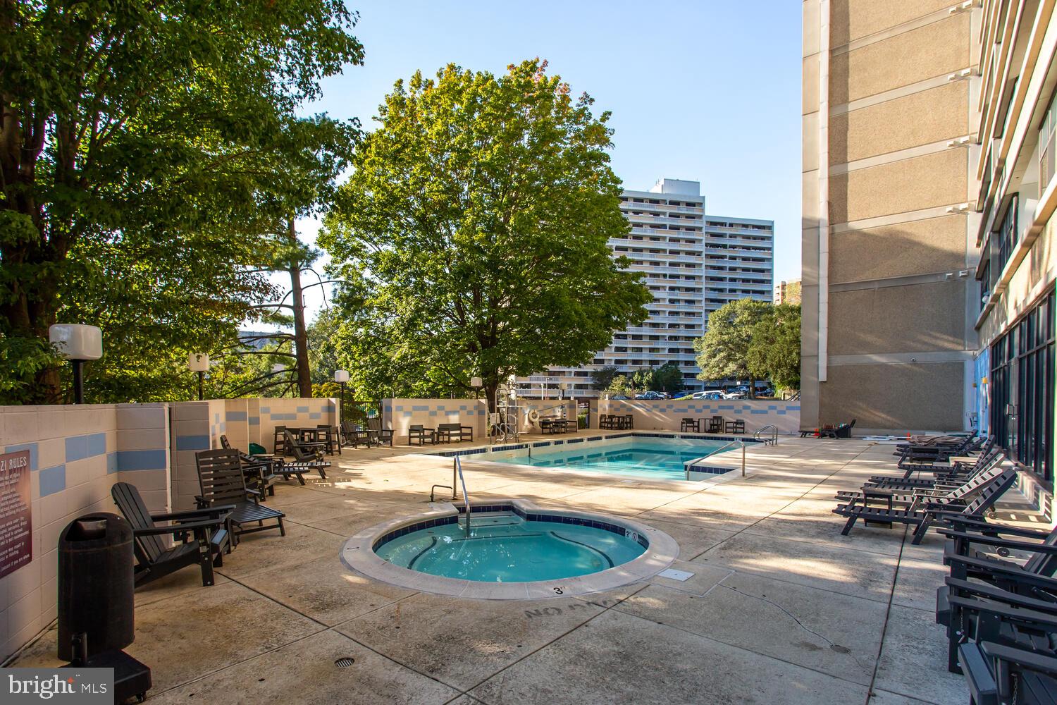 5911 Edsall Road, Unit 206 Alexandria, VA 22304 - Photo 21 of 40 a view of a swimming pool with a patio