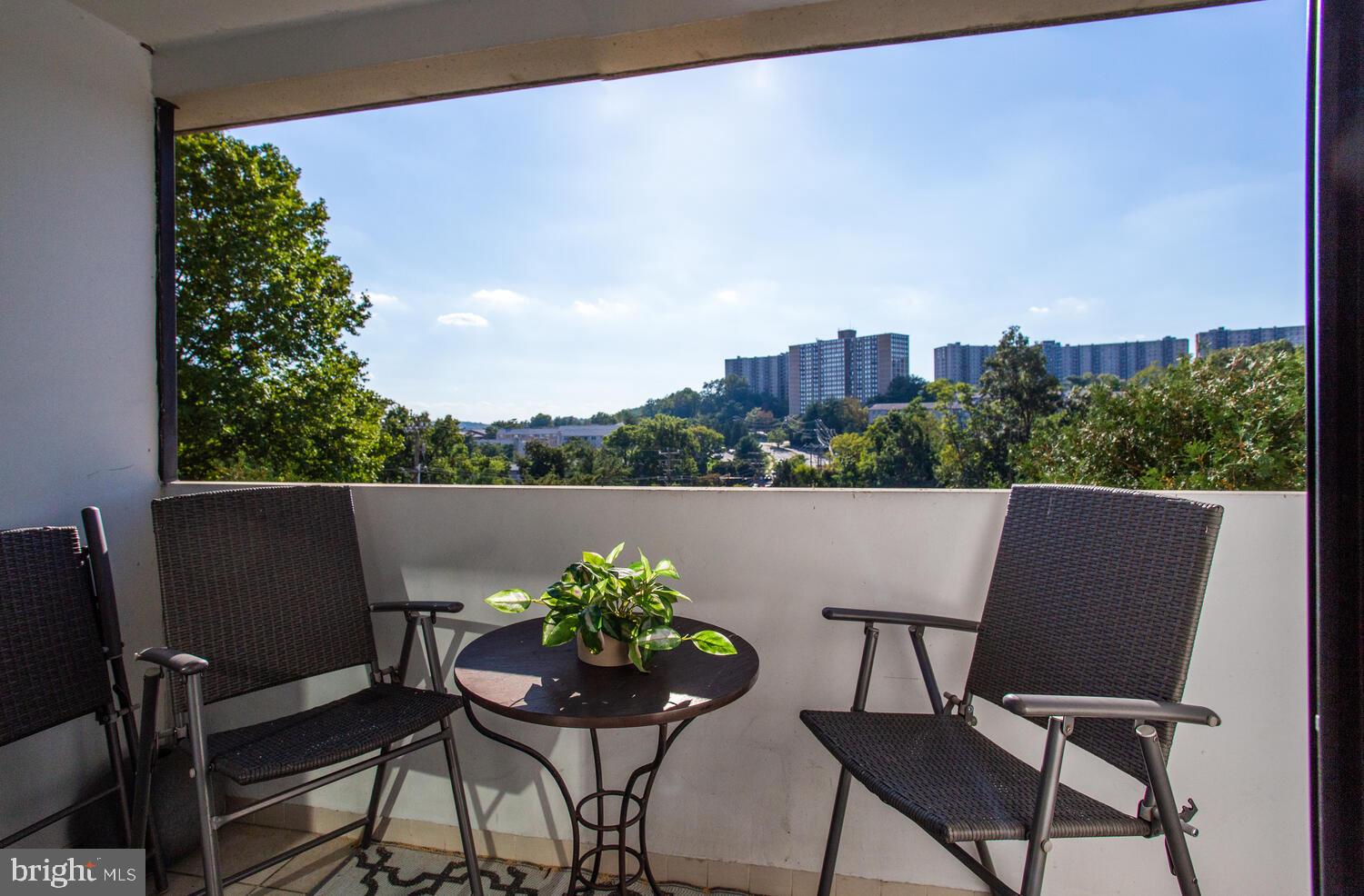 5911 Edsall Road, Unit 206 Alexandria, VA 22304 - Photo 8 of 40 a view of an chairs and table in patio