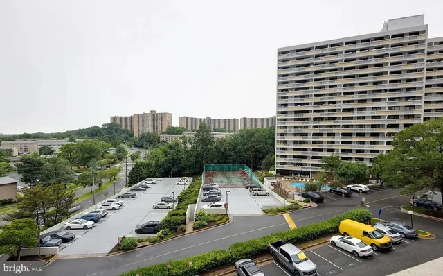 a view of swimming pool with seating space
