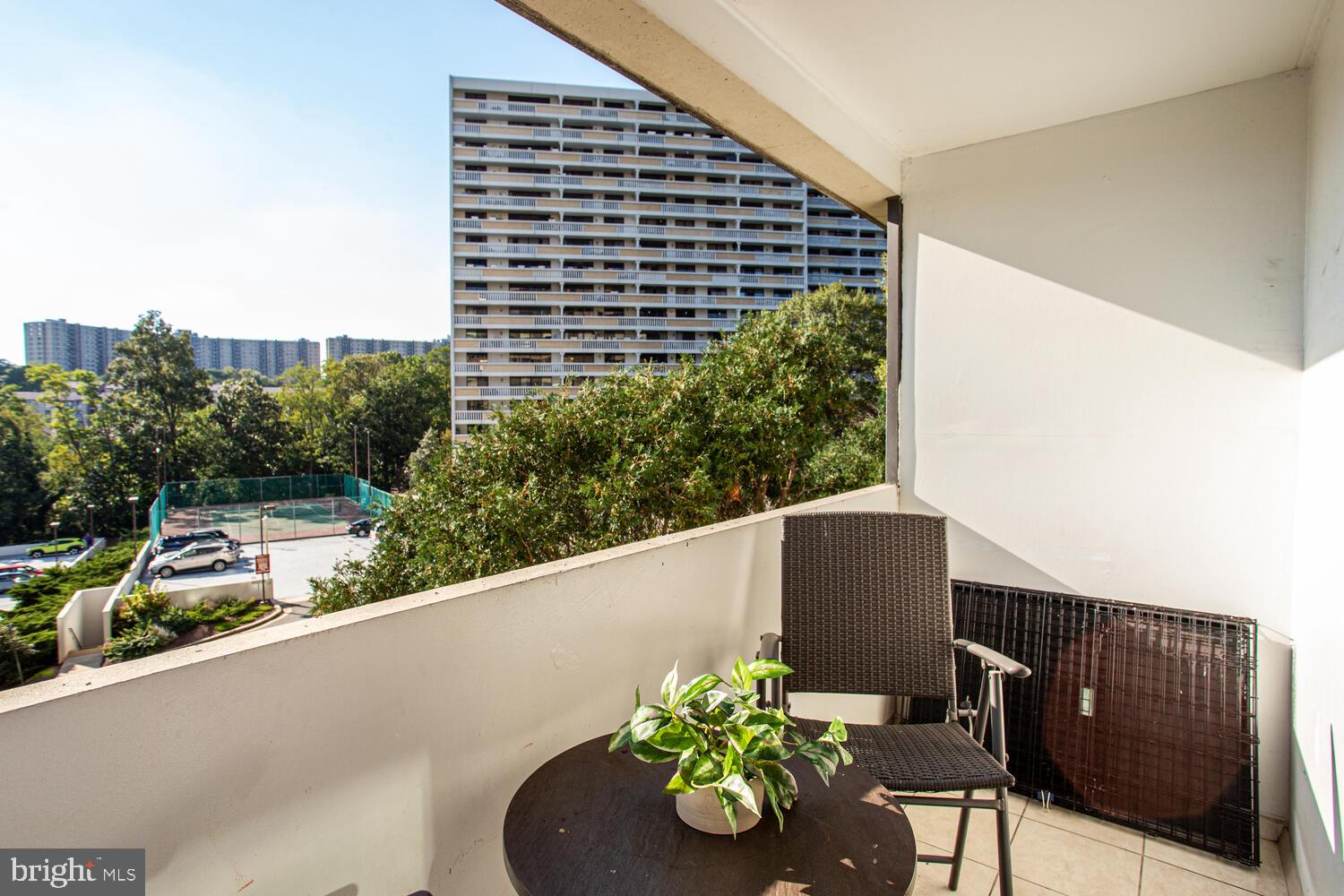 5911 Edsall Road, Unit 206 Alexandria, VA 22304 - Photo 10 of 40 a view of a chairs and table in a balcony