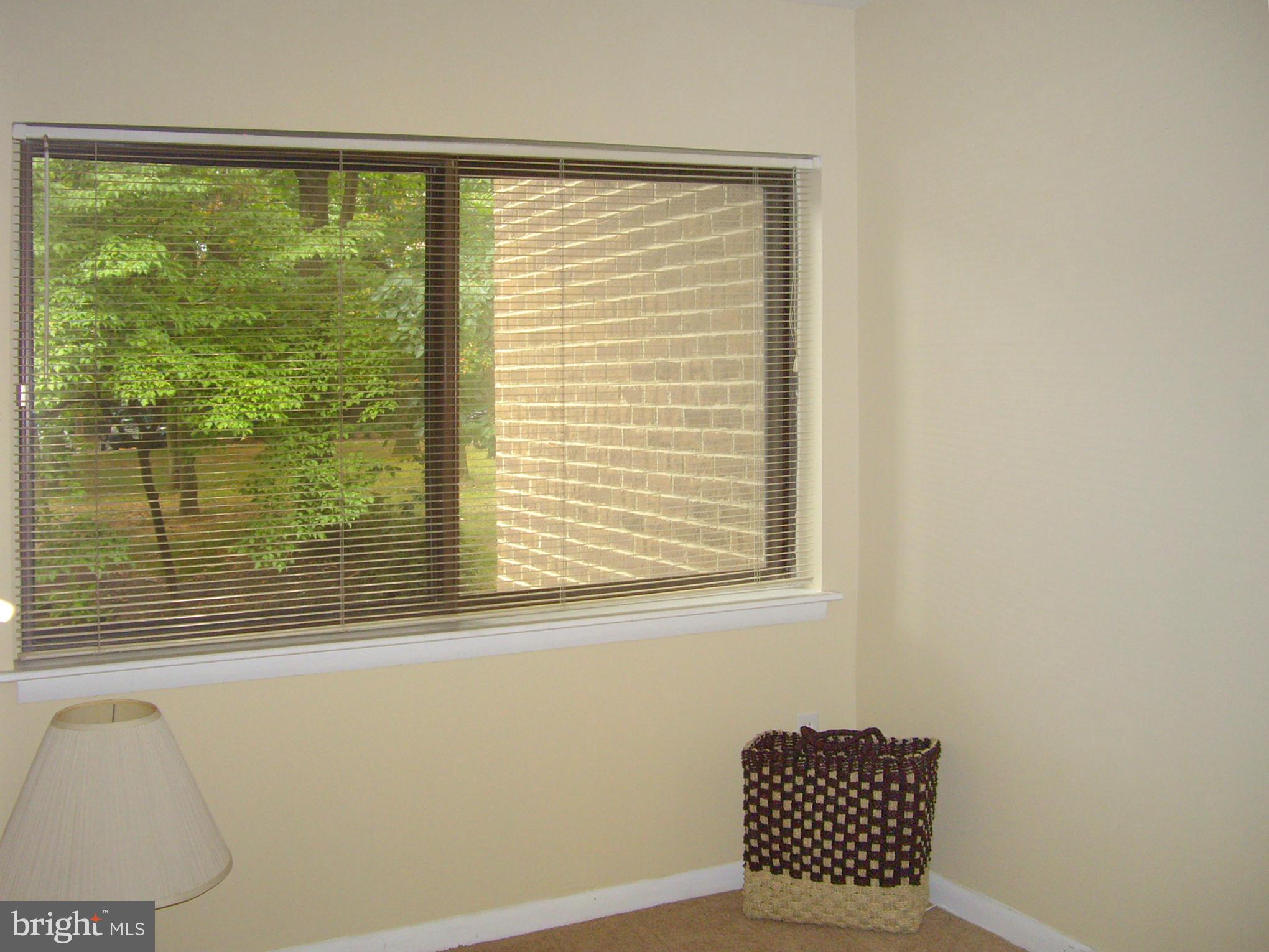 11212 Chestnut Grove Square, Unit 114 Reston, VA 20190 - Photo 18 of 18 a view of a balcony with chair