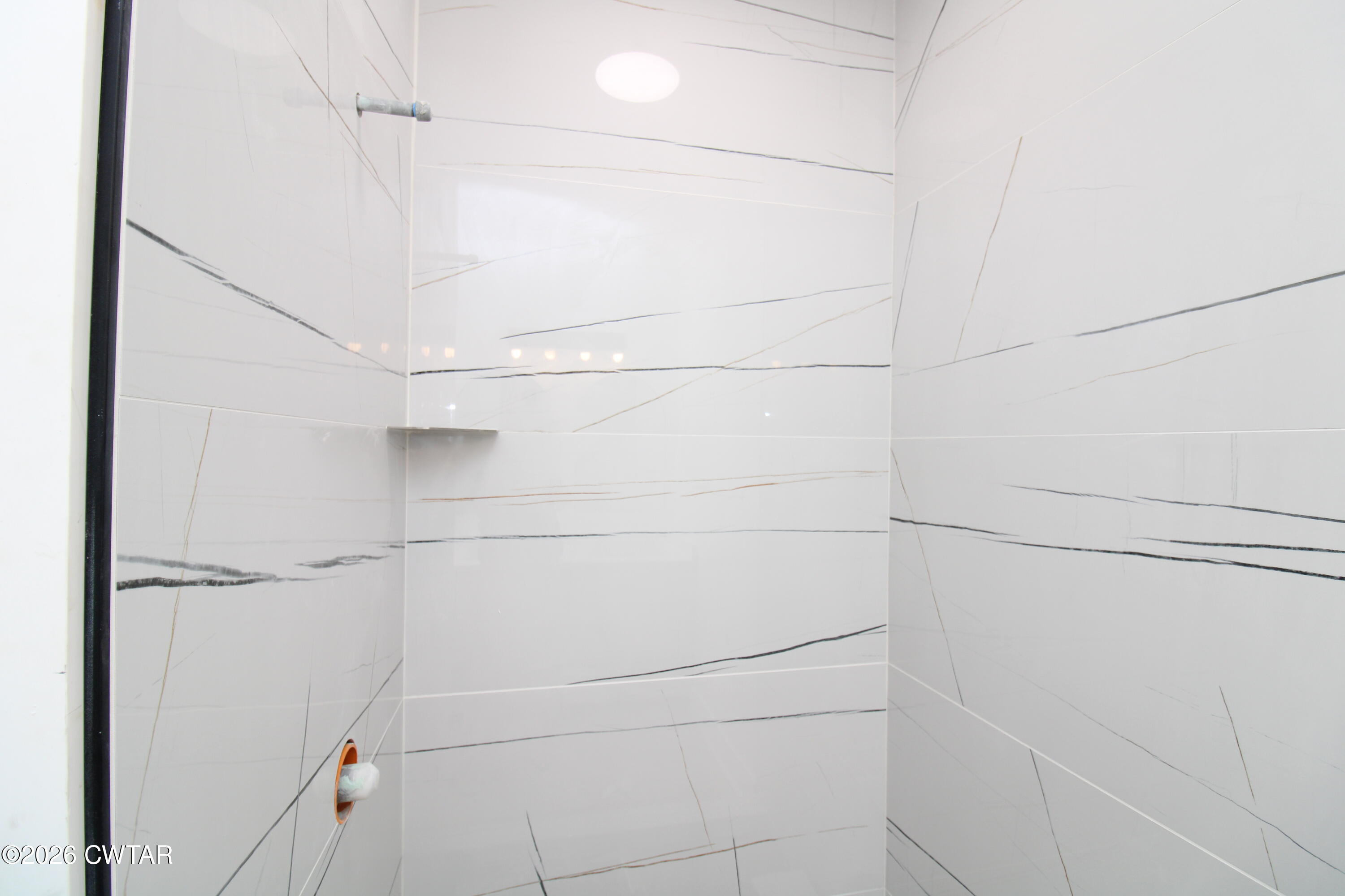 25 Weatherstone Drive Jackson, TN 38305 - Photo 8 of 15 a bathroom with a shower