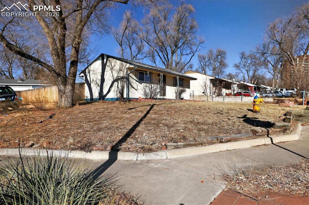 702 Erie Road Colorado Springs, CO 80910 - Photo 6 of 15 Ranch-style house with stucco siding