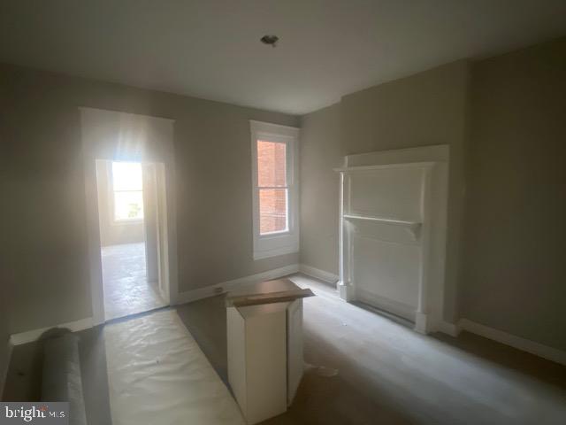 2730 Riggs Avenue Baltimore, MD 21216 - Photo 8 of 9 a view of empty room with window