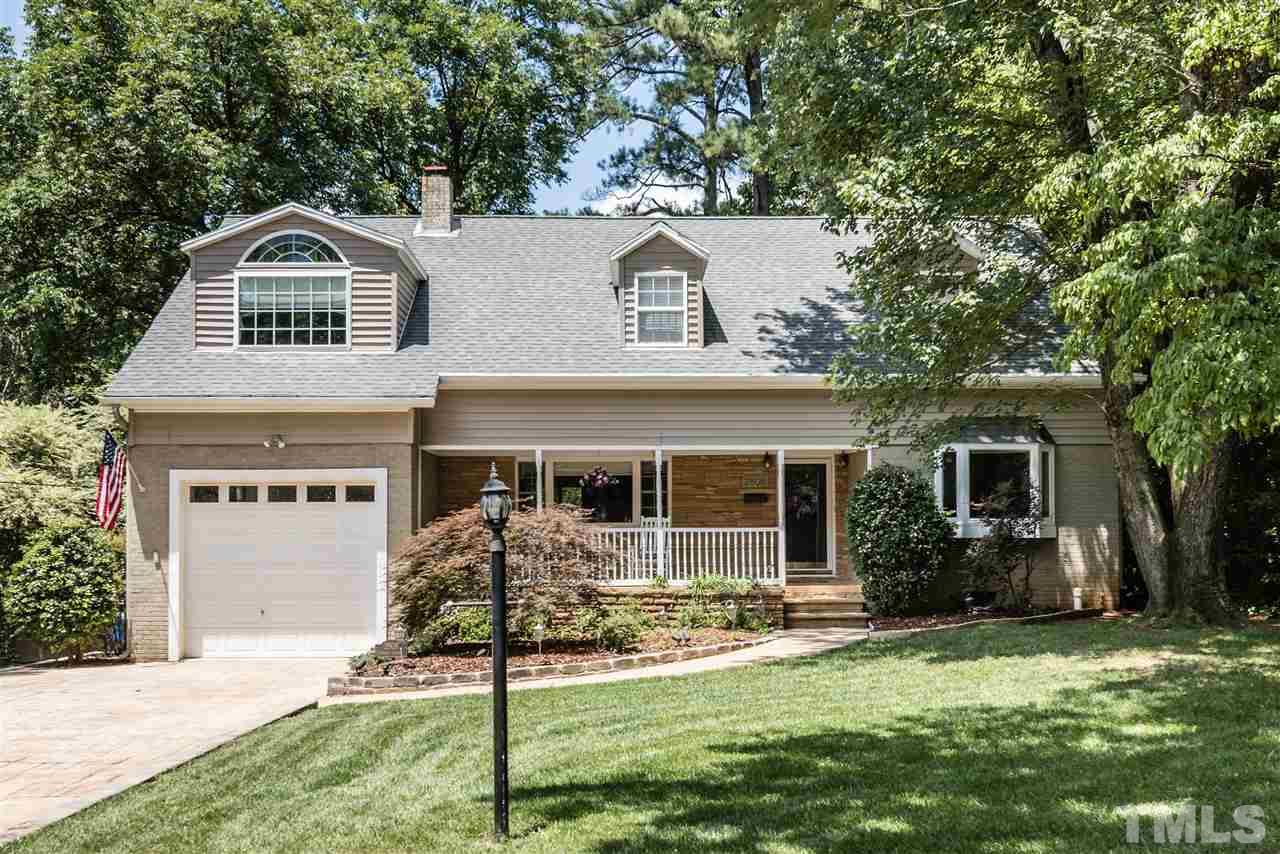 2808 Oberry Street Raleigh, NC 27607 - Photo 1 of 24 a front view of a house with a yard