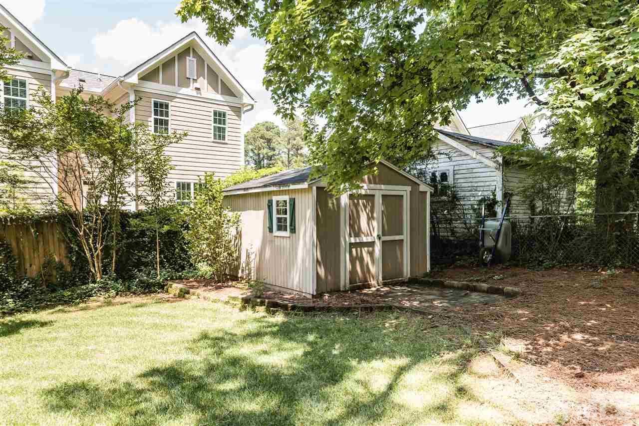 2808 Oberry Street Raleigh, NC 27607 - Photo 21 of 24 a view of a house with yard and tree in the background