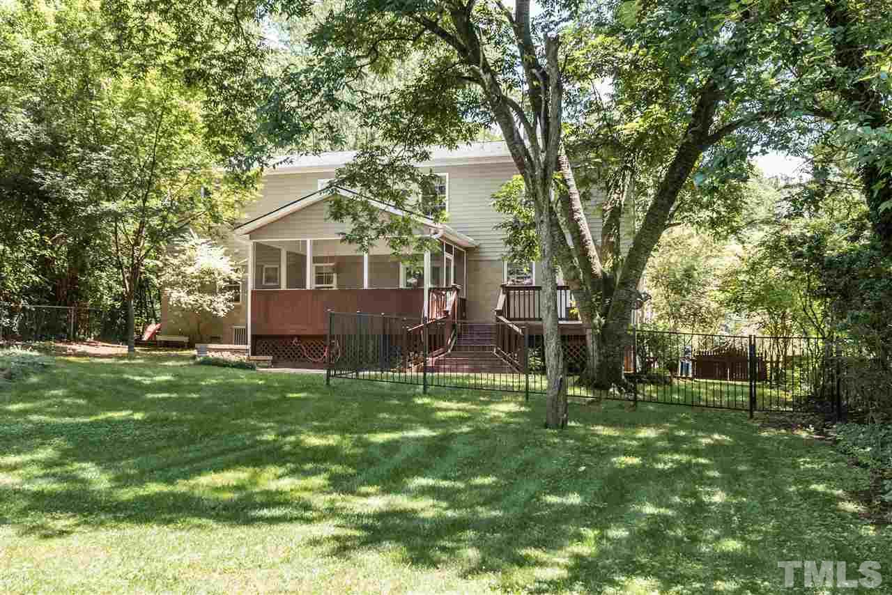 2808 Oberry Street Raleigh, NC 27607 - Photo 22 of 24 a view of a house with a backyard