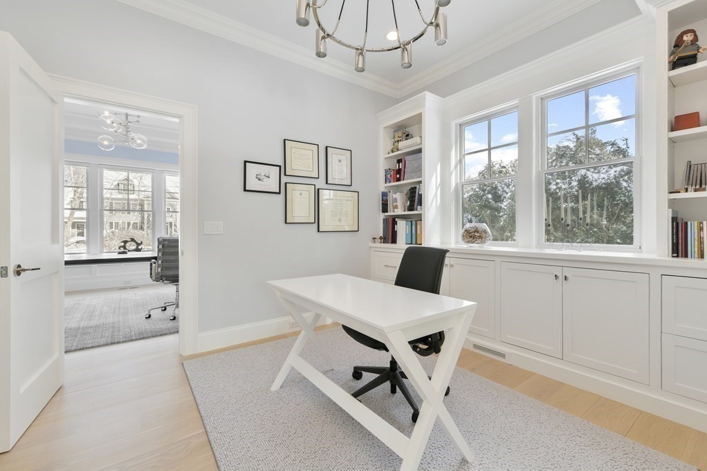 32 Burroughs Road Lexington, MA 02420 - Photo 15 of 38 a view of a workspace with furniture and a window