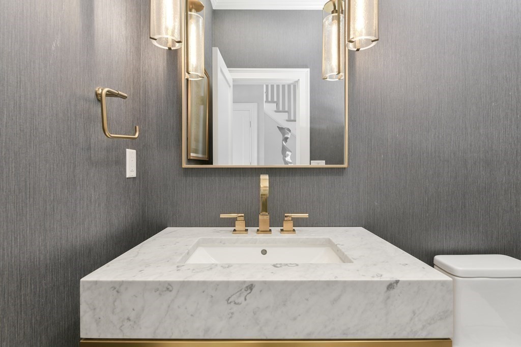 32 Burroughs Road Lexington, MA 02420 - Photo 16 of 38 a bathroom with a sink and a mirror