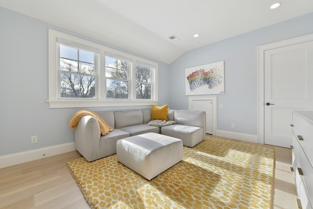 32 Burroughs Road Lexington, MA 02420 - Photo 27 of 38 a living room with furniture and a window