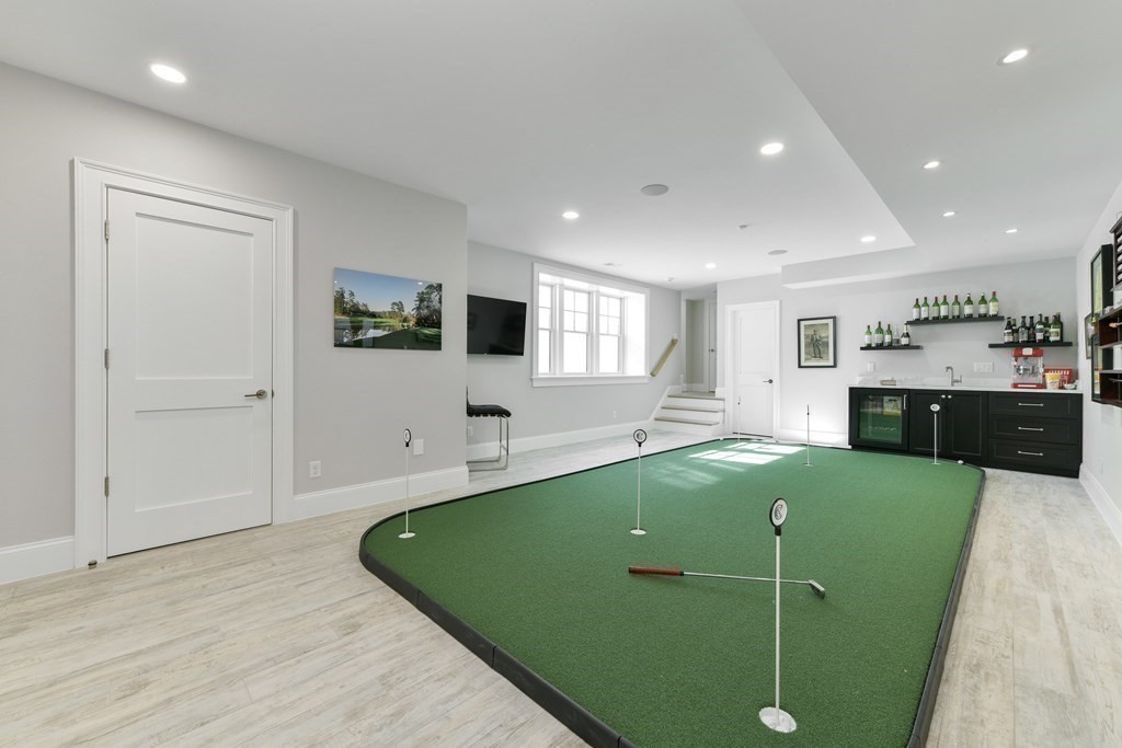 32 Burroughs Road Lexington, MA 02420 - Photo 35 of 38 a view of a kitchen with kitchen island a sink stainless steel appliances and cabinets