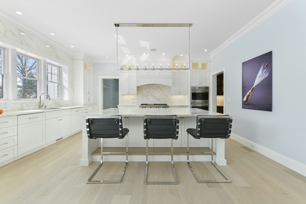 32 Burroughs Road Lexington, MA 02420 - Photo 5 of 38 a living room with furniture and a fireplace