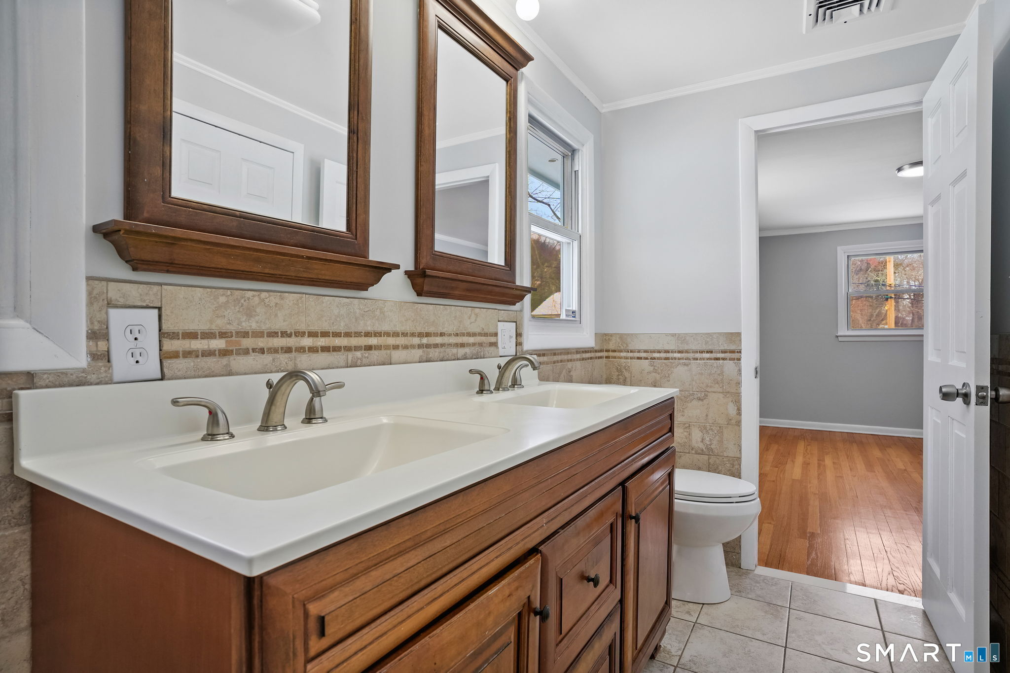 25 Fairchild Road Stratford, CT 06614 - Photo 14 of 40 a bathroom with a sink and a toilet