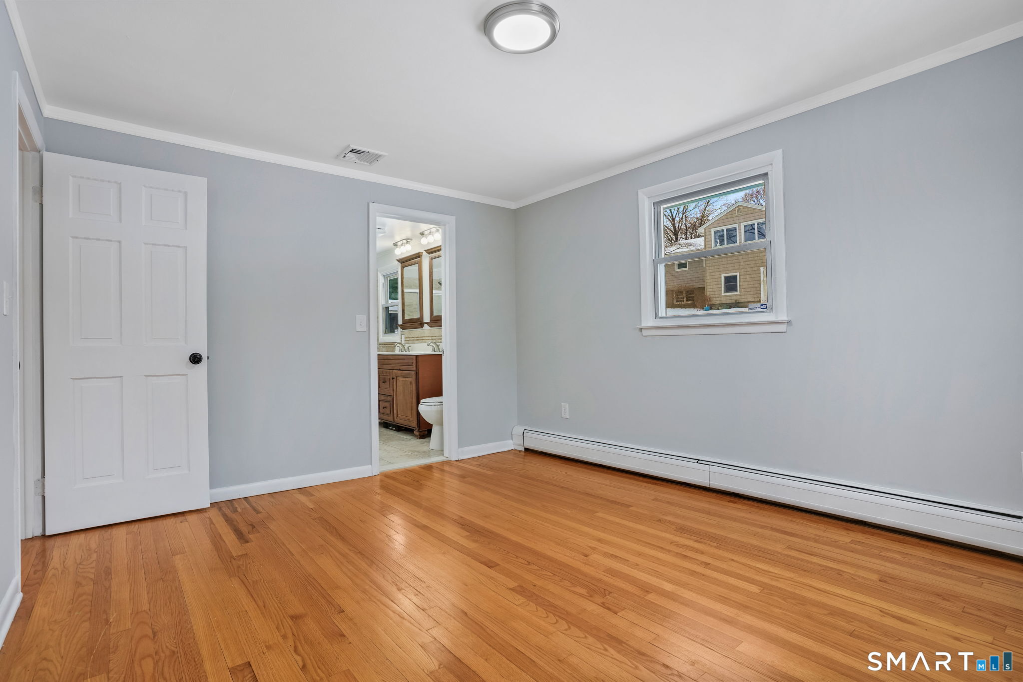 25 Fairchild Road Stratford, CT 06614 - Photo 16 of 40 a view of empty room with wooden floor