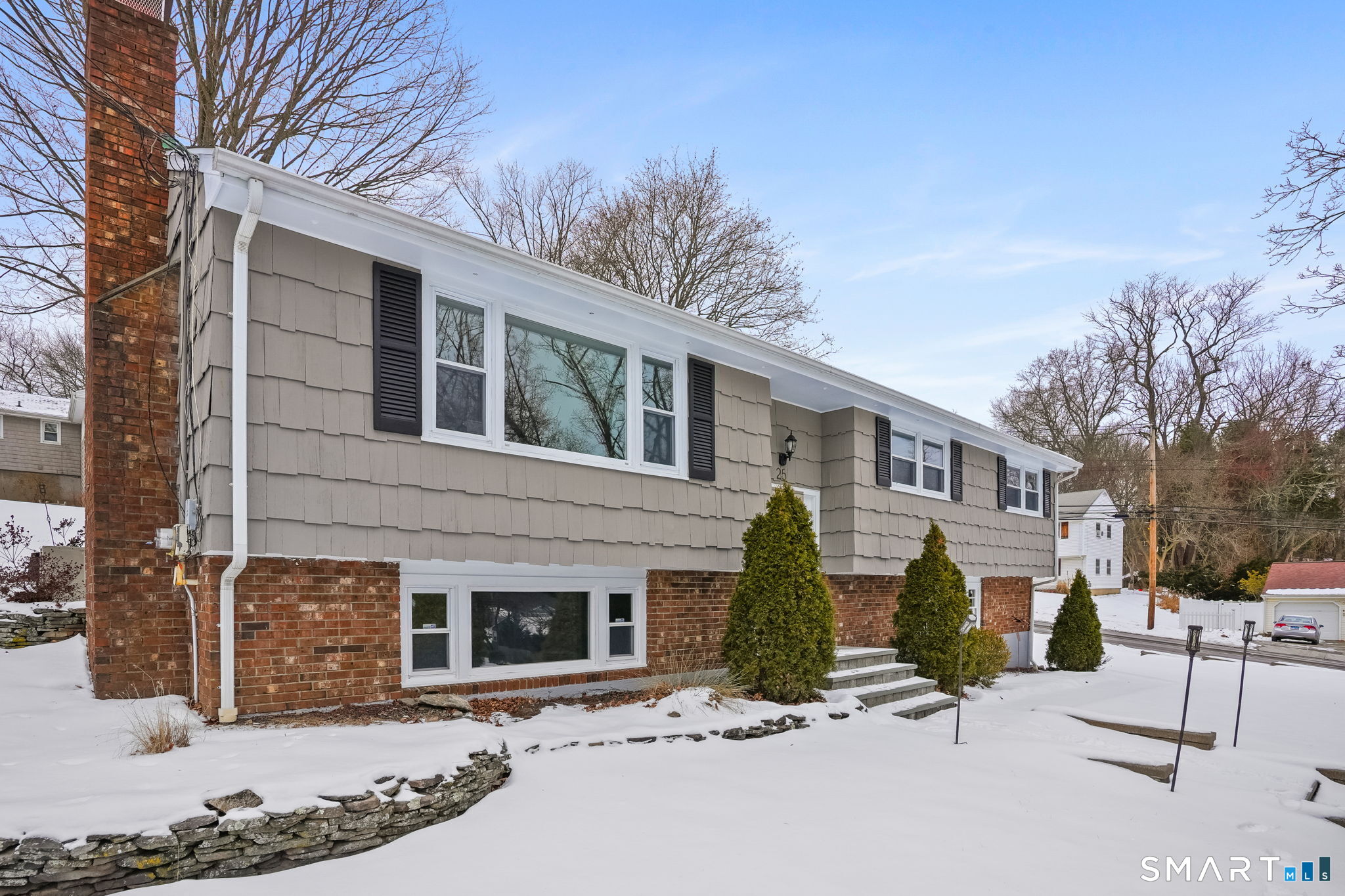 25 Fairchild Road Stratford, CT 06614 - Photo 38 of 40 a front view of a house with a yard