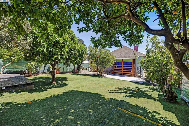 a view of backyard with green space