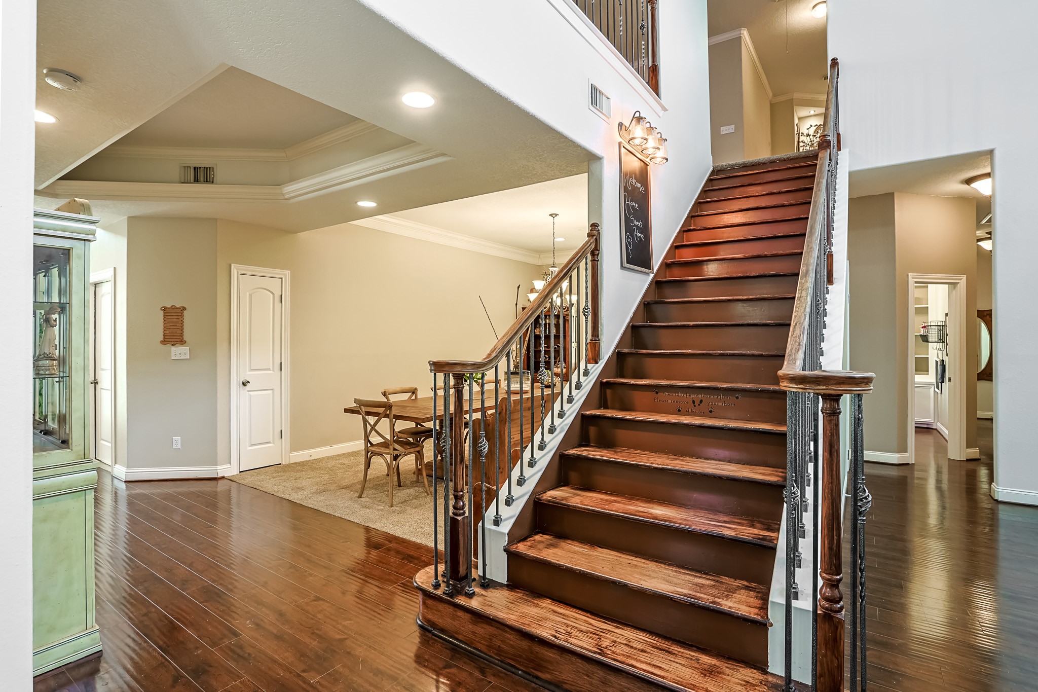 30119 West Geneva Drive Spring, TX 77386 - Photo 18 of 35 Elegant wood staircase with wrought-iron spindles connecting the open main living areas with the private upstairs spaces