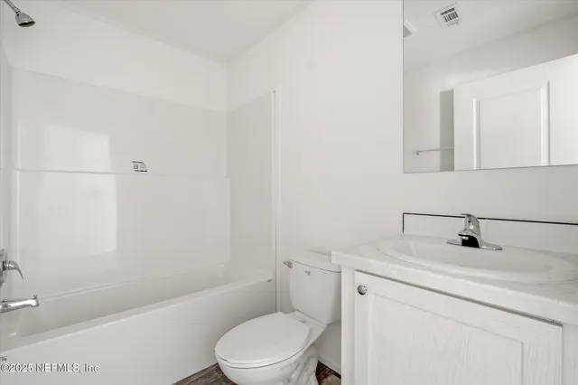 a view of outdoor space and deck front of house