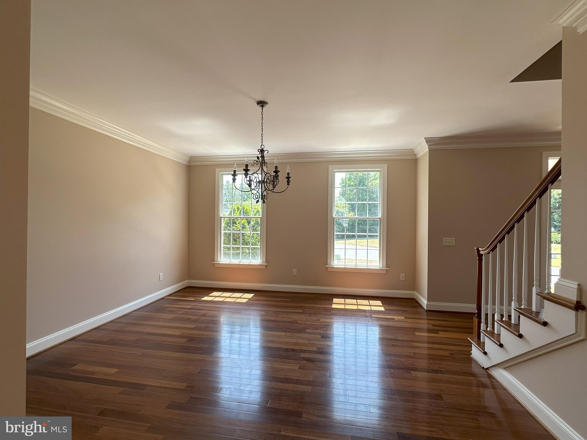 564 Brookfield Drive Dover, DE 19901 - Photo 15 of 25 a view of an empty room with wooden floor and a window