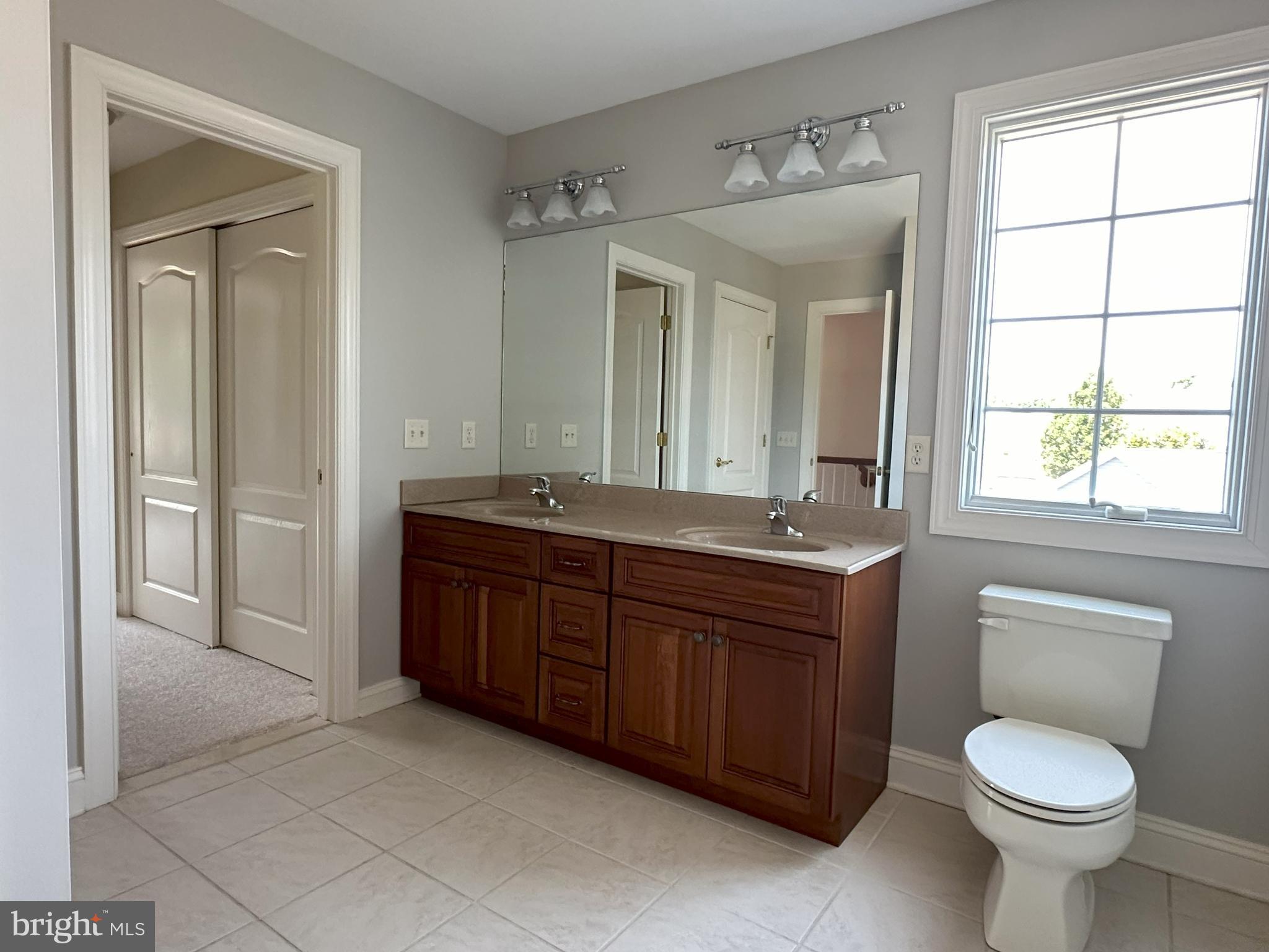 564 Brookfield Drive Dover, DE 19901 - Photo 20 of 25 a bathroom with a sink and a toilet