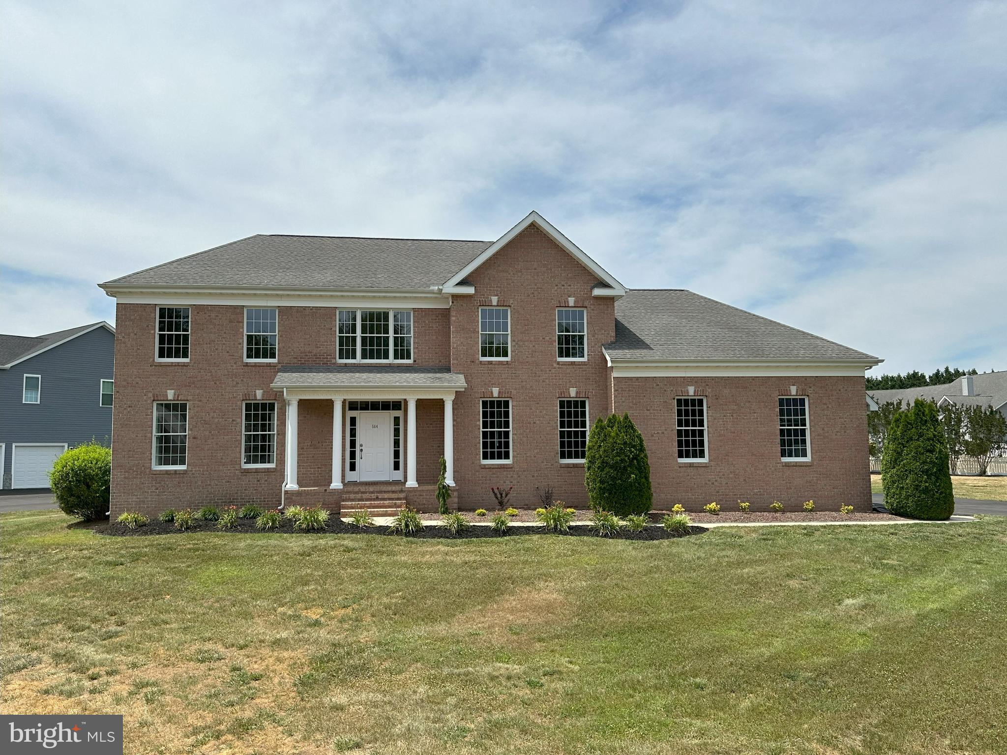 564 Brookfield Drive Dover, DE 19901 - Photo 2 of 25 a front view of a house with garden