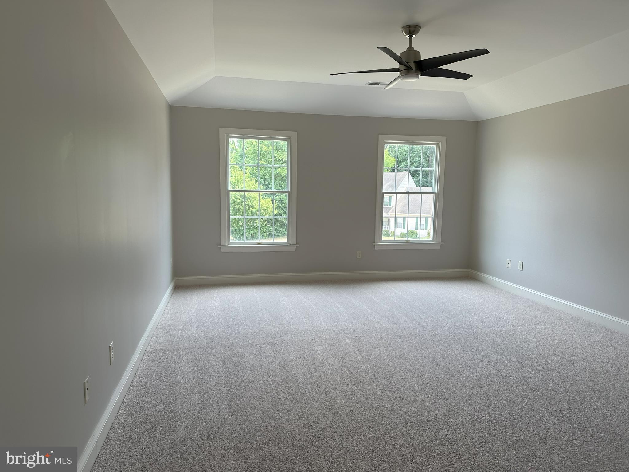 564 Brookfield Drive Dover, DE 19901 - Photo 23 of 25 an empty room with a window and a fan