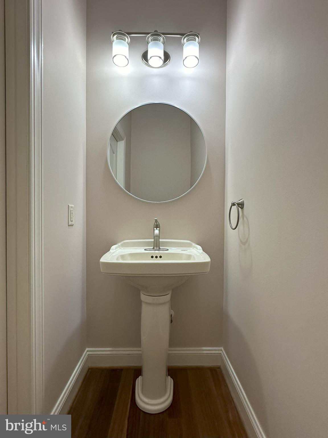 564 Brookfield Drive Dover, DE 19901 - Photo 24 of 25 a bathroom with a sink toilet and mirror