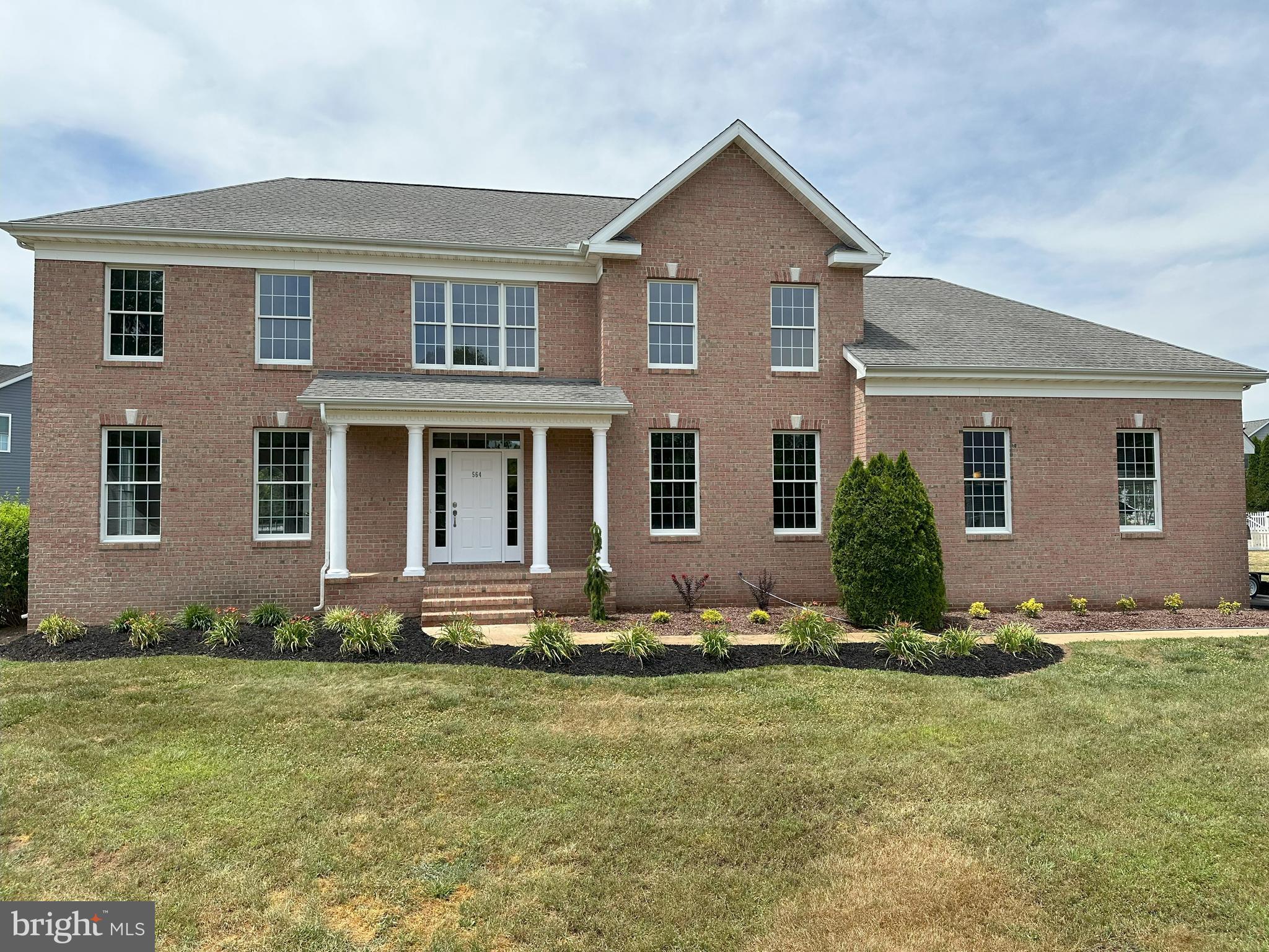 564 Brookfield Drive Dover, DE 19901 - Photo 3 of 25 front view of a house with a yard