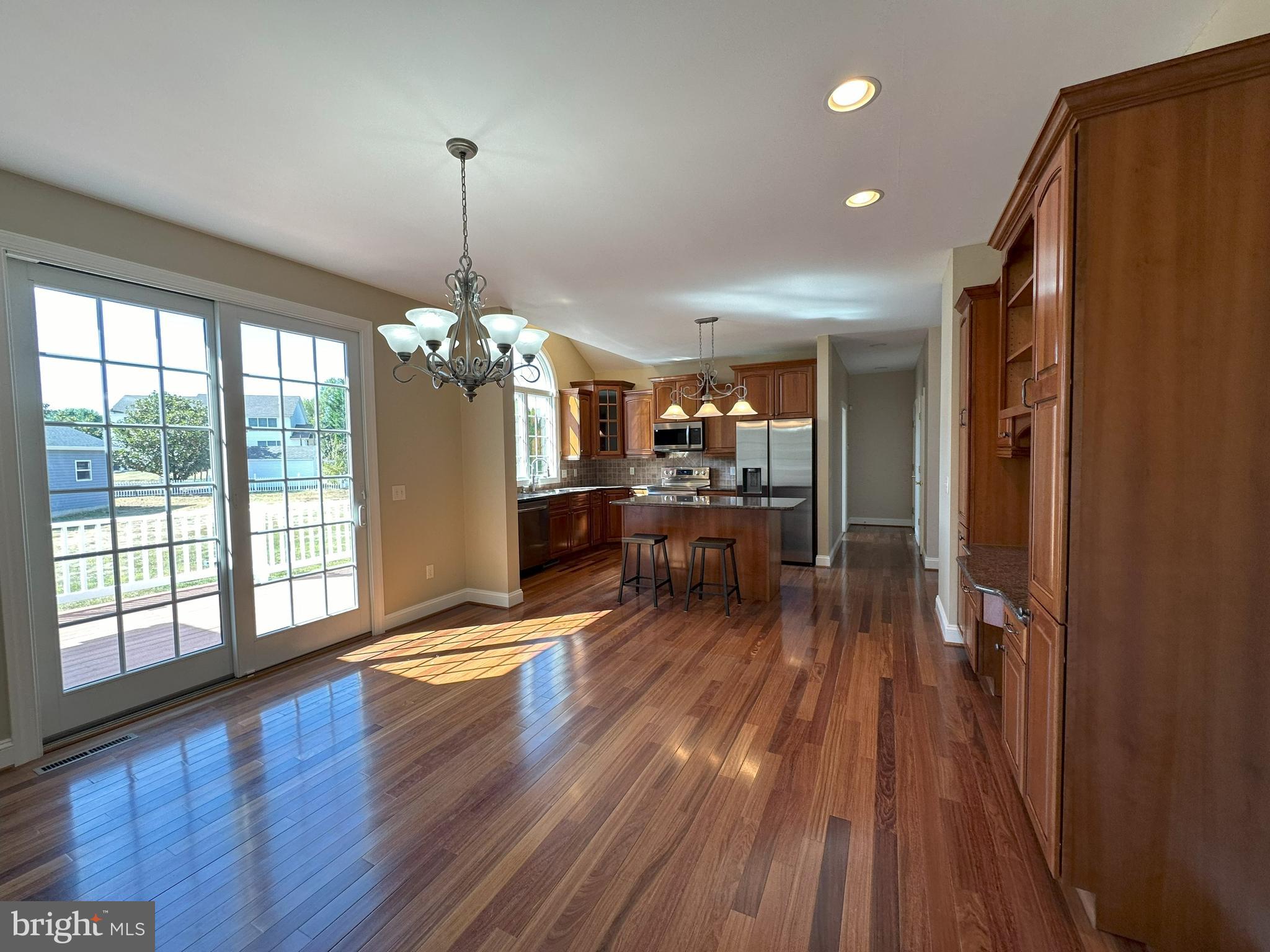 564 Brookfield Drive Dover, DE 19901 - Photo 5 of 25 a living room with furniture and a chandelier
