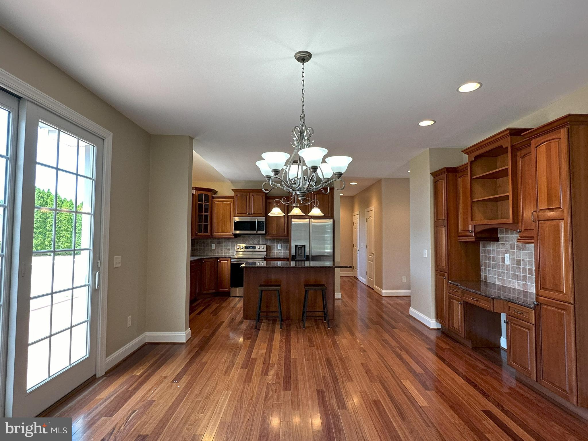 564 Brookfield Drive Dover, DE 19901 - Photo 9 of 25 a view of a dining room with furniture window and wooden floor