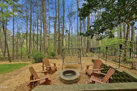 a view of swimming pool with outdoor seating