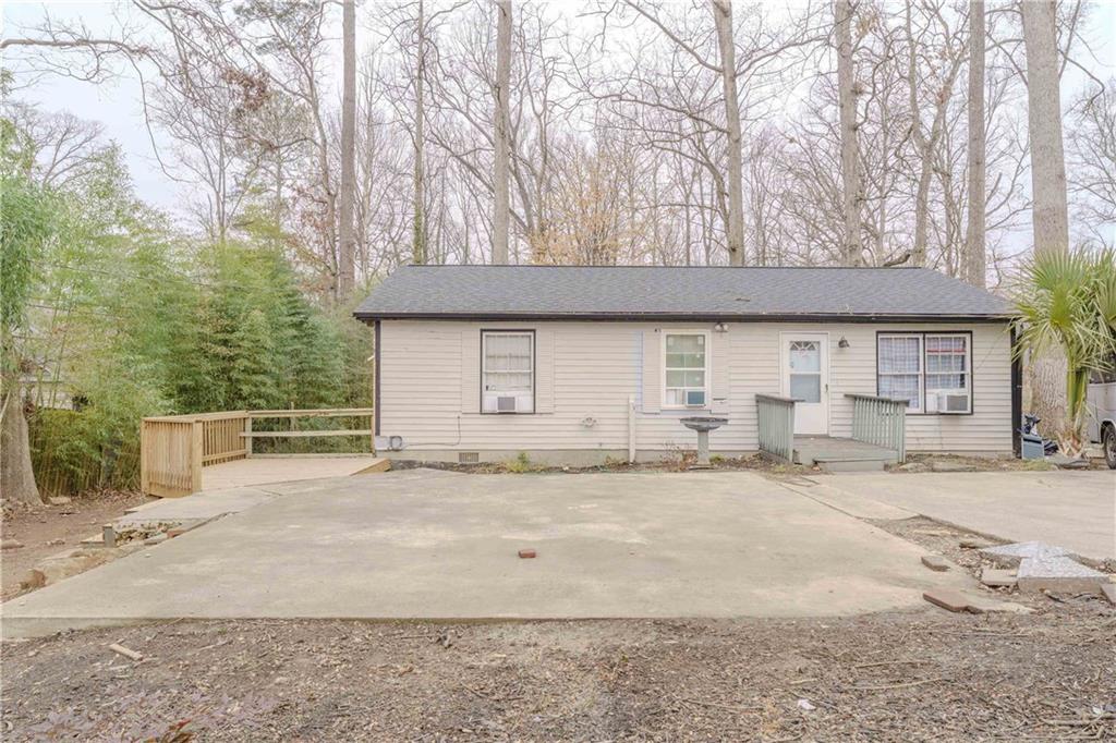 6543 Sage Street Atlanta, GA 30340 - Photo 1 of 18 a view of a house with a snow in the yard