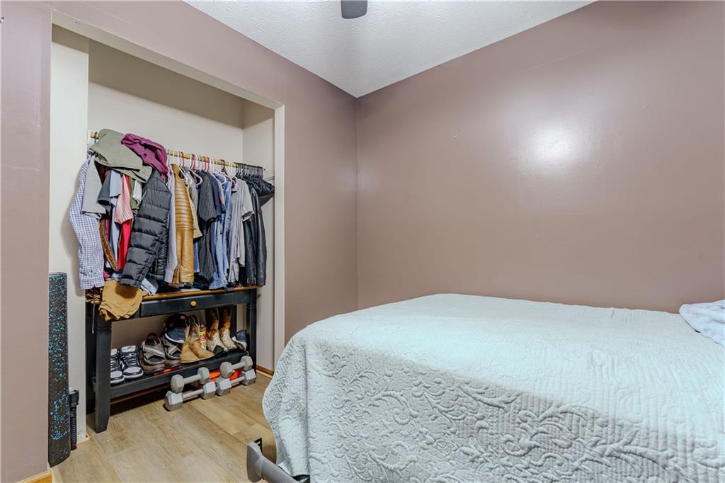 6543 Sage Street Atlanta, GA 30340 - Photo 14 of 18 a bedroom with a bed and a window