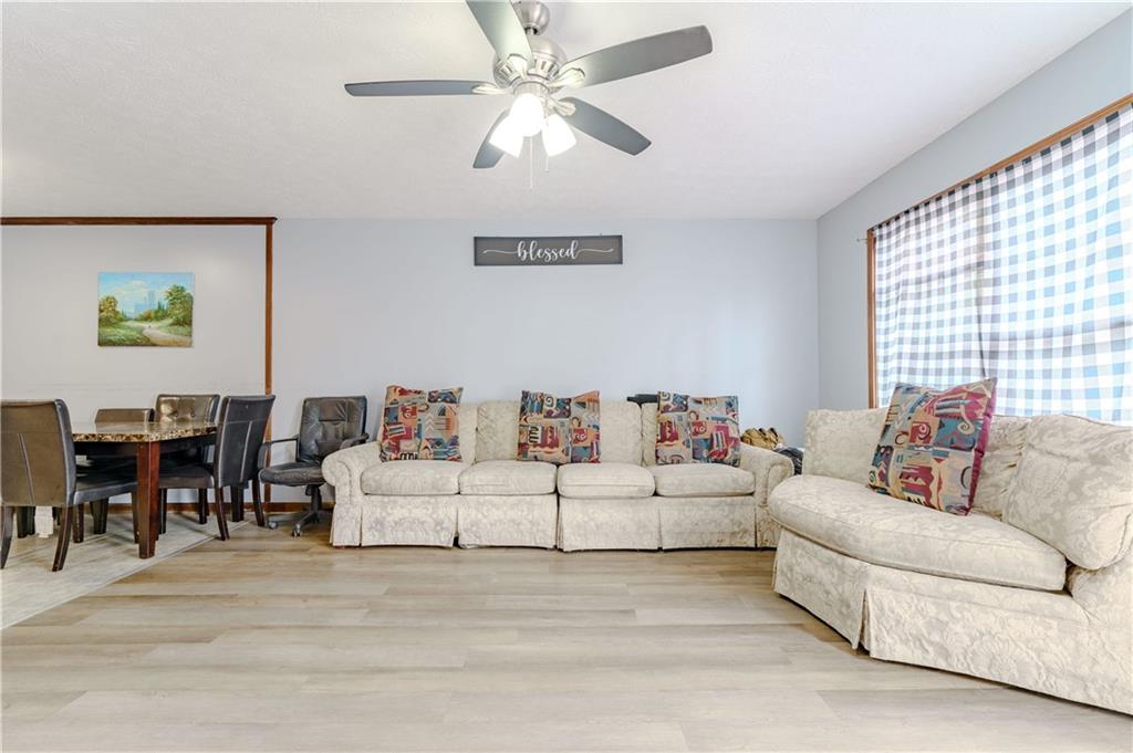6543 Sage Street Atlanta, GA 30340 - Photo 4 of 18 a living room with furniture and a large window