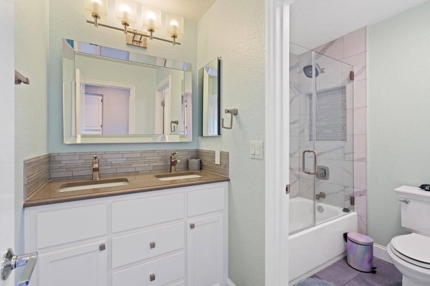 3335 Sandalwood Road Rocklin, CA 95765 - Photo 21 of 30 a bathroom with a bathtub shower sink vanity and toilet