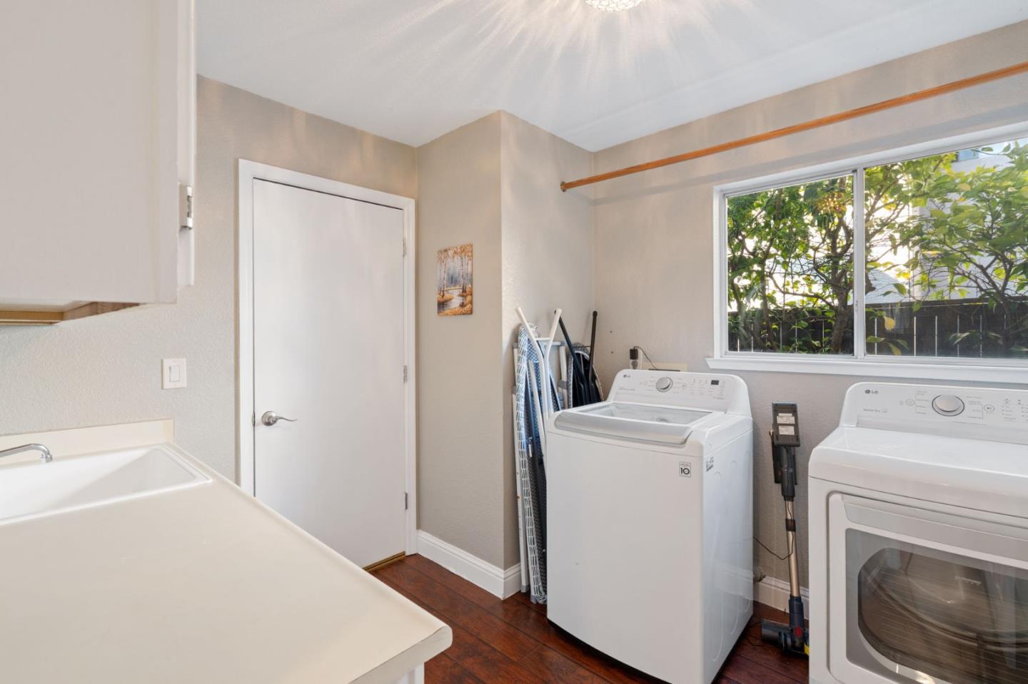 3335 Sandalwood Road Rocklin, CA 95765 - Photo 24 of 30 a view of washer and dryer with bathroom in the background