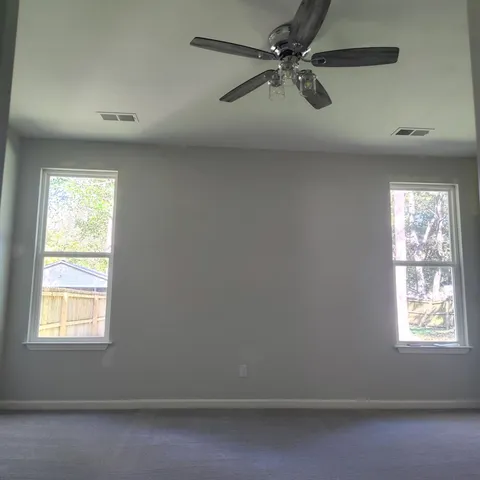 a kitchen with a stove and a refrigerator