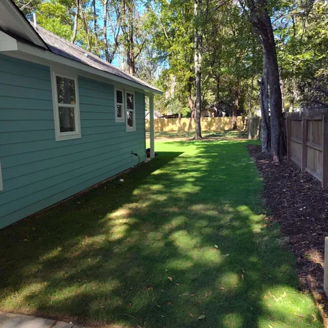 a bathroom with a sink a toilet and vanity