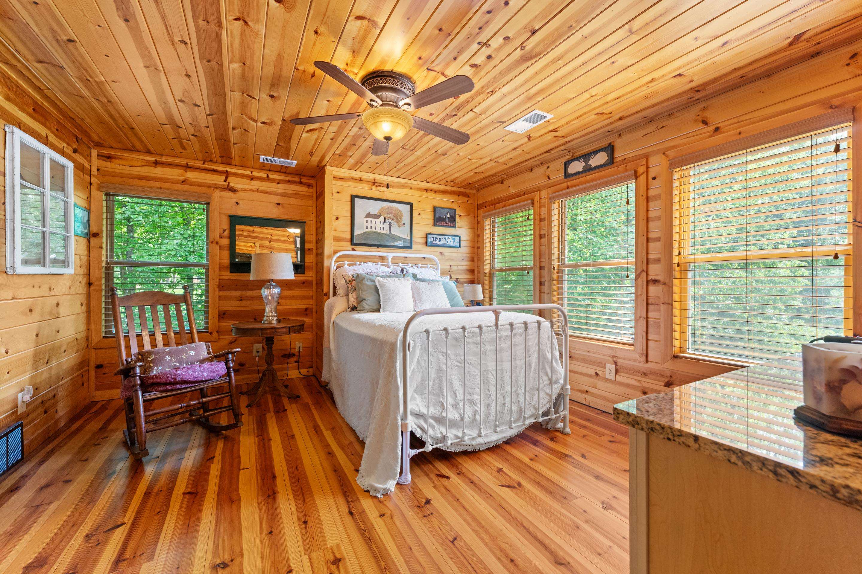 950 Cherry Road Eads, TN 38028 - Photo 14 of 30 Room with extensive wood-finish wall paneling, ceiling planks, and wood-finish flooring