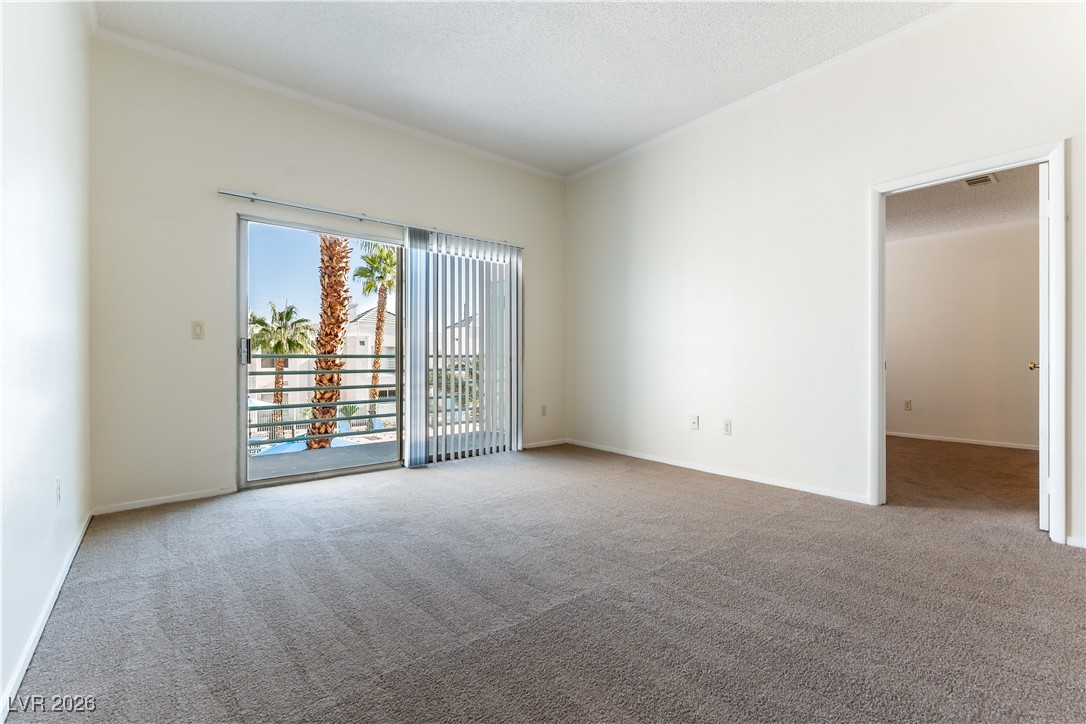 7100 West Pirates Cove Road, Unit 2089 Las Vegas, NV 89145 - Photo 4 of 32 LIVING ROOM WITH NEW CARPET AND PAINT