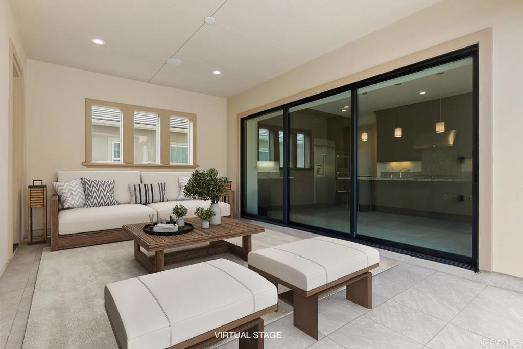 2527 Wellspring Street Carlsbad, CA 92010 - Photo 12 of 28 a living room with furniture and window