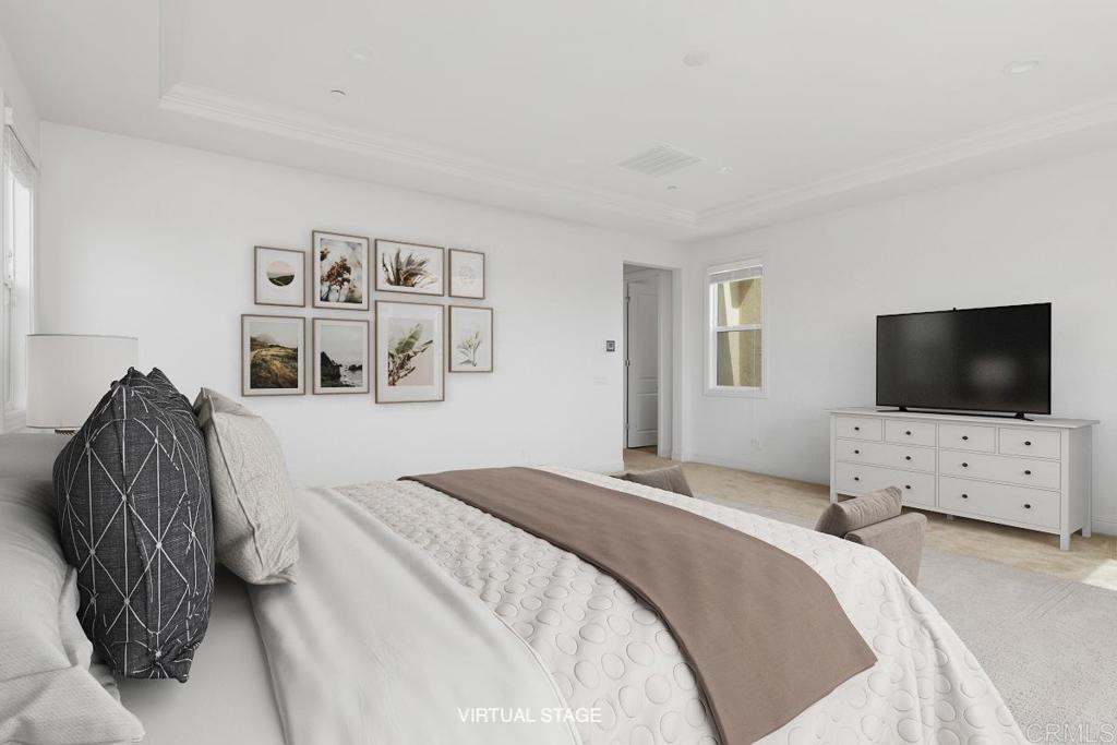 2527 Wellspring Street Carlsbad, CA 92010 - Photo 15 of 28 a bedroom with a bed and a flat screen tv