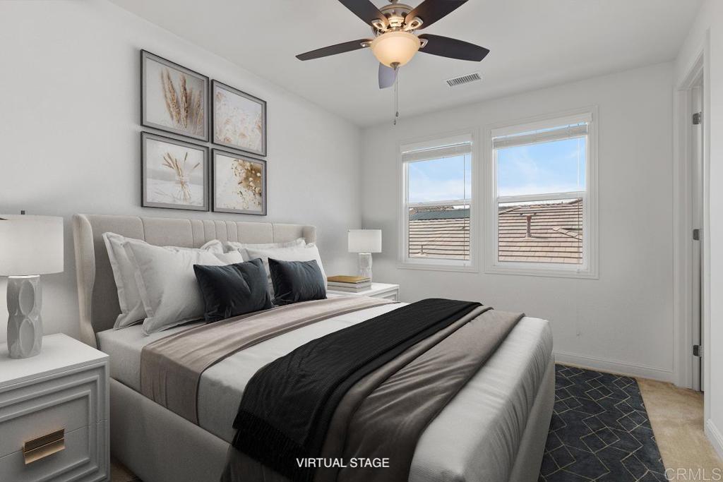 2527 Wellspring Street Carlsbad, CA 92010 - Photo 16 of 28 a bedroom with bed and window