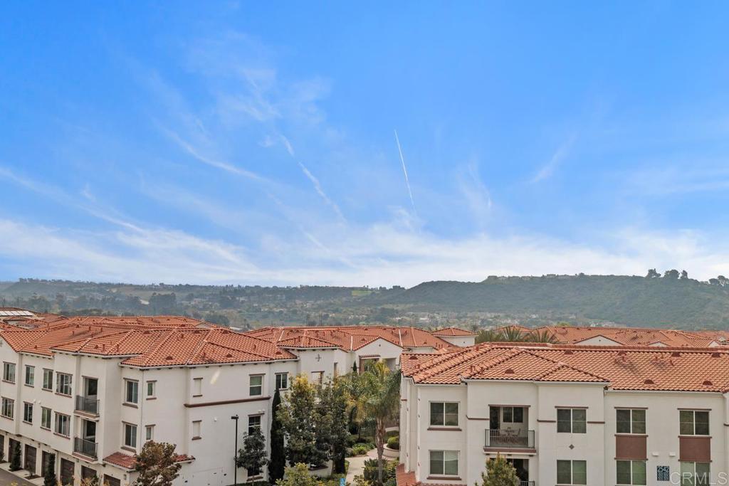 2527 Wellspring Street Carlsbad, CA 92010 - Photo 21 of 28 a front view of residential houses with city view
