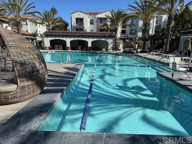 2527 Wellspring Street Carlsbad, CA 92010 - Photo 28 of 28 a view of front of house with a yard