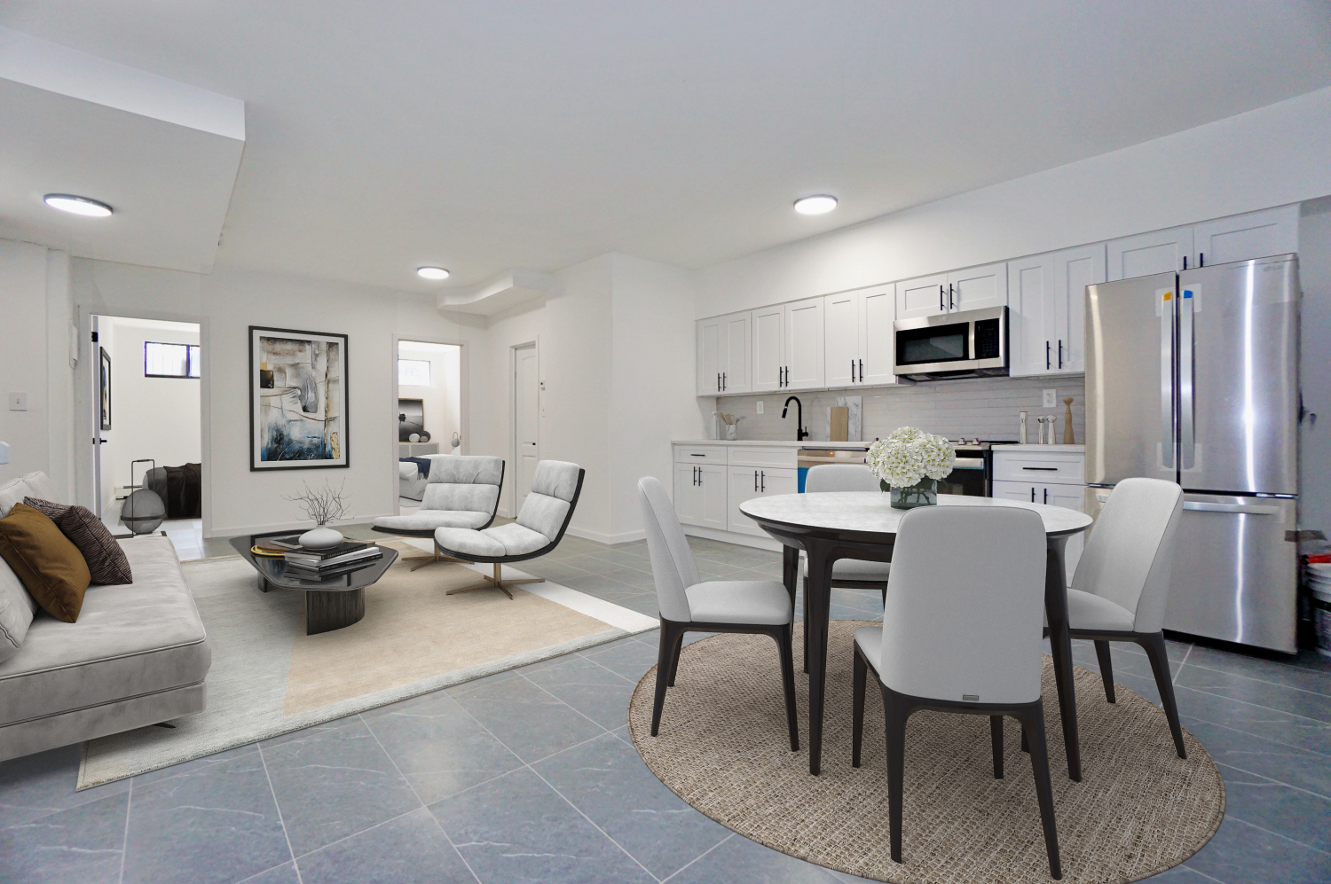a living room with furniture and a wooden floor