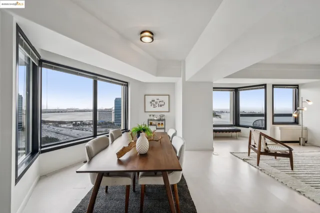 a view of a livingroom with furniture and window
