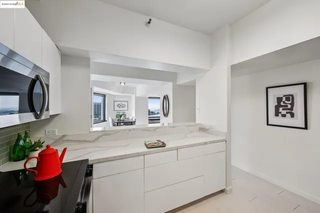 a room with a sink and a mirror