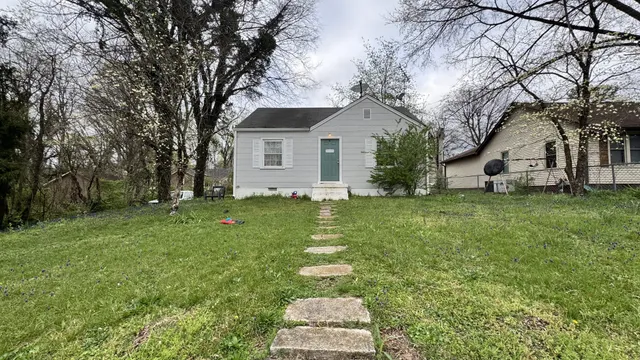 a front view of house with yard