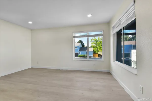 an empty room with windows